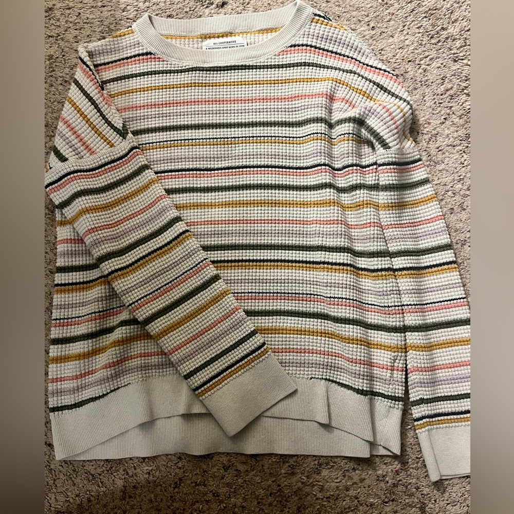 Medium off white sweater with salmon, mustard, dark gray stripes